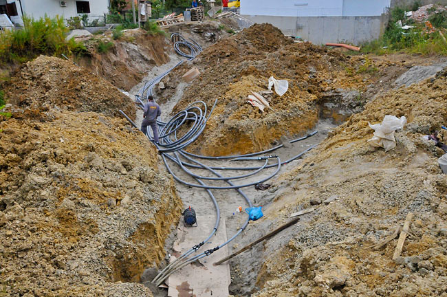 Trenches to pass the probe extensions