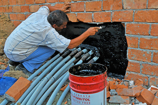 Waterproofing the passage of the probes inside the building