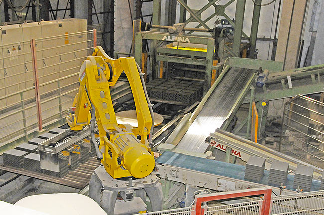 Putting freshly cut blocks onto the dryer pallet