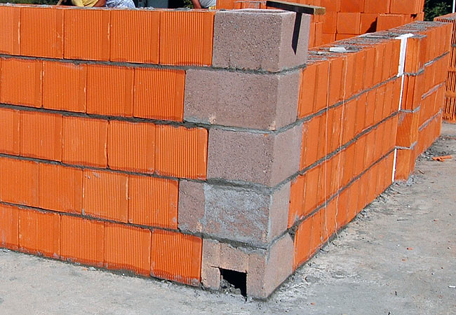 Stack of corner with the hole made in the first corner of the stack