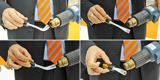 Shrinking the piece of streched PE-Xa pipe back to size with a hot air blower - 1