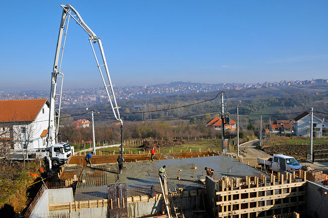 Progression of pouring concrete on the ground floor slab