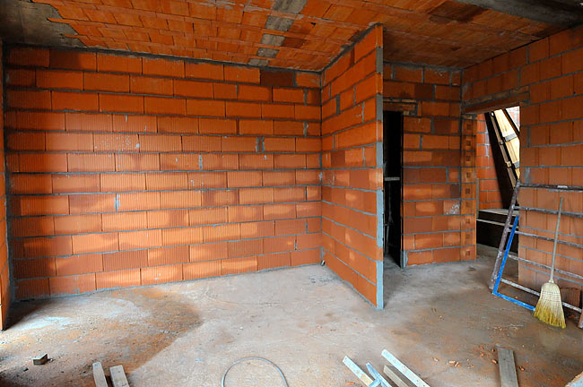 Finished partition wall between kitchen and bedroom in apartment-1