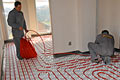 Installation of Rehau underfloor heating with RAUTHERM pipes and Vario boards